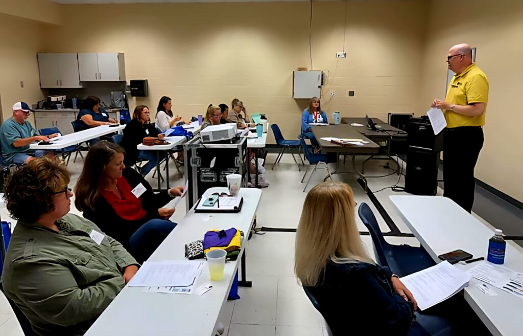 Our rural utilities expertise is on display as Scott Robbins presents to a group of office professionals.